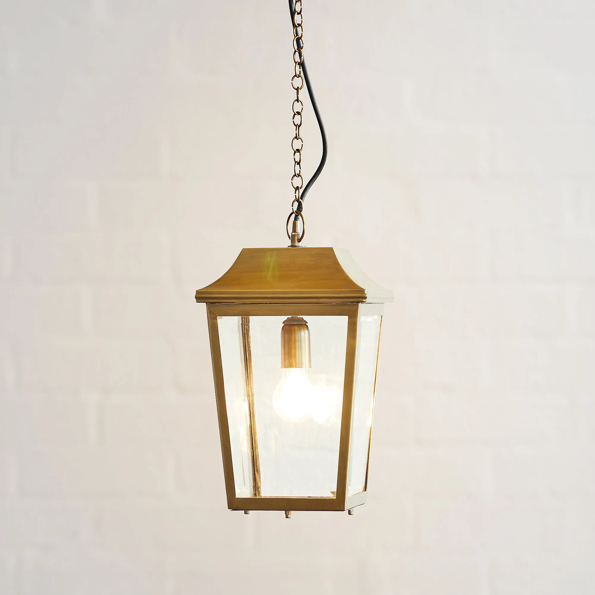 Crail IP44 exterior hanging lantern in antique brass