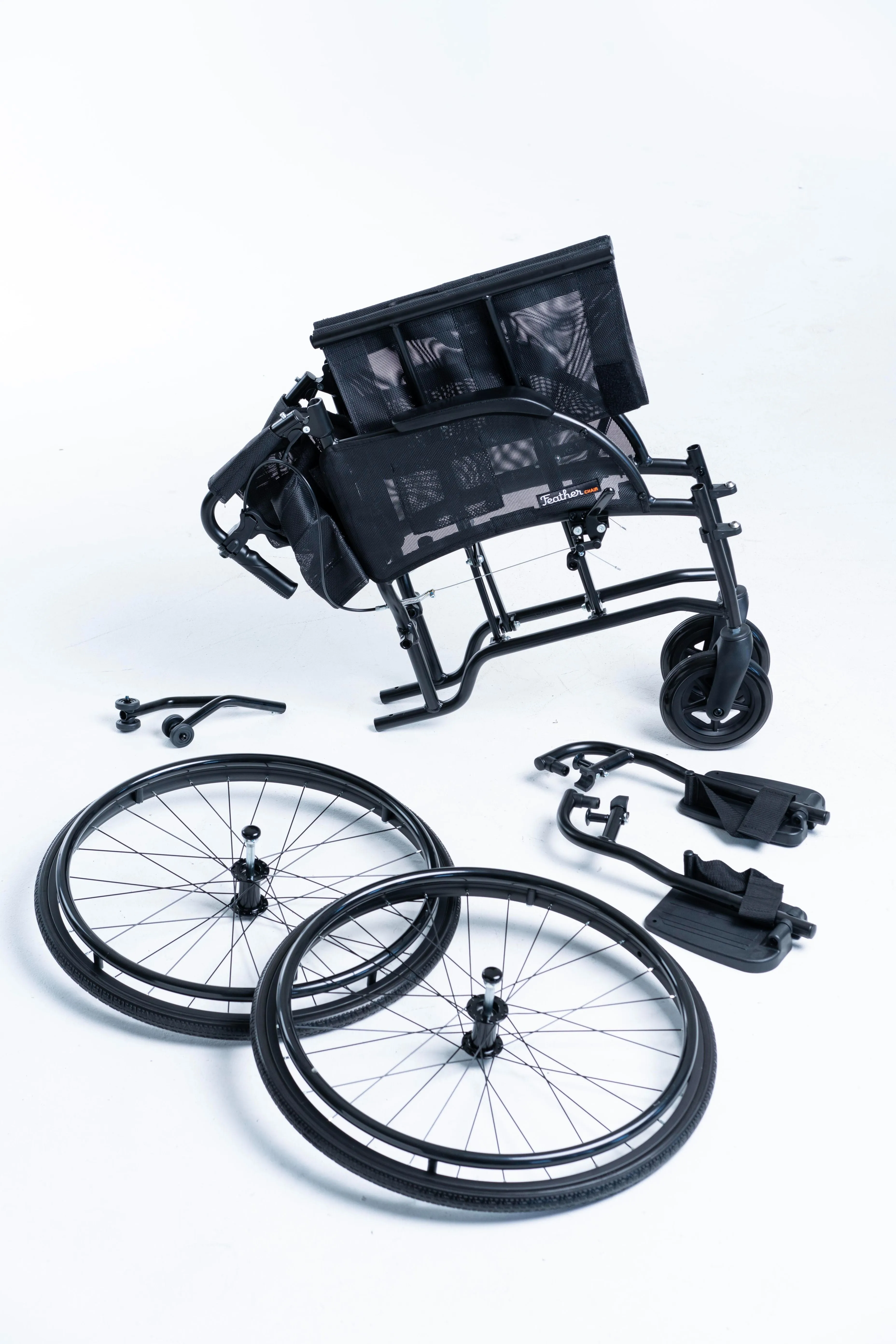 Manual Featherlite Wheel Chair - 13.5 lbs. (Pop on Quick Release Wheels)